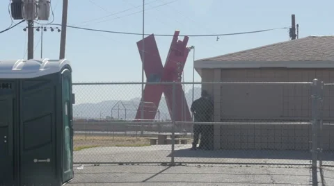 Border Patrol Agents Talking Near the US Border with Mexico in the Background Stock Footage 60432950