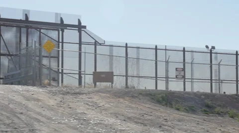 Border Patrol SUV Sits Guarding the American and Mexican Border Video stock 60431613