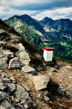 Border pillar in the mountains Stock Photos