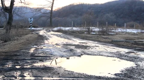 Border post in the forest with mud and puddles Video stock 48408280