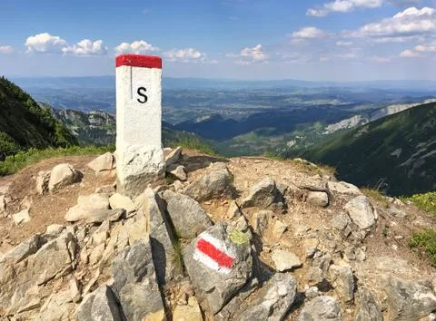 The border post is high in the mountains. Border of Poland and Slovakia Stock Photos