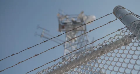Border Security Tower, Cameras and Sensors On Tower. Fenced In Tower Stock Footage 166818282