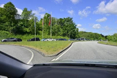 Border split with Germany and Denmark flags, jam toward Germany Stock Photos