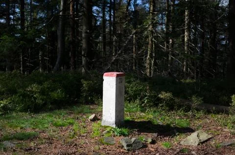 Border stone - pillar is marking borderline of state and country Stock Photos