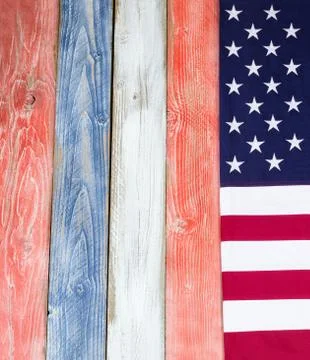 Border of USA flag on rustic painted wooden boards in national colors Stock Photos