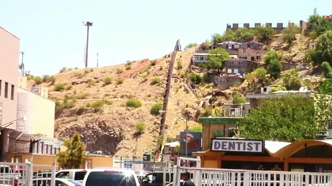 Border Wall Cuts Through Nogales, Mexico Stock Footage 180131790