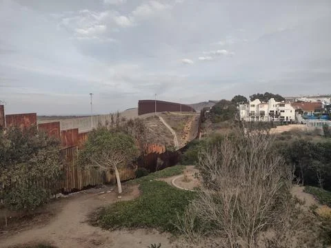 Border Wall separating Mexico Tijuana United States California Stock Photos