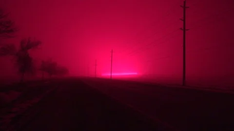 Borealis of greenhouse glows LED light pollution turns sky red at night Stock Footage 99771012