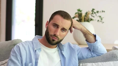 Bored and lonely man feeling sad at home Stock Footage 335588472