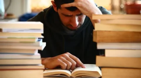 Bored boy studying Stock Footage 10895162