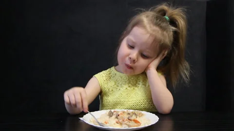 Bored child eating Stock Footage 111332595