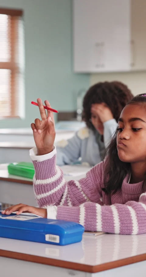 Bored, doubt and child in classroom at school for development, growth or Stock Footage 341096920