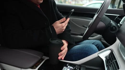 Bored driver in traffic jam. Driver spends time in traffic jam. Man in modern Stock Footage 324963367