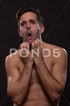 Bored dull face expression young man body Stock Photos