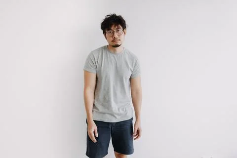 Bored face man stand boringly in full body isolated on white. Stock Photos