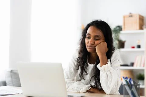 Bored Indian student watching tutorial 스톡 사진