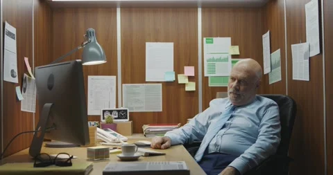 Bored inefficient employee wasting time in the office Stock Footage 307325947