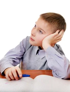 Bored Kid doing Homework Foto stock