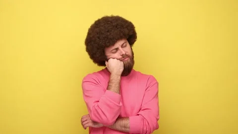 Bored man leaning head on hand laziness and apathy, procrastination, looks Stock Footage 170717185