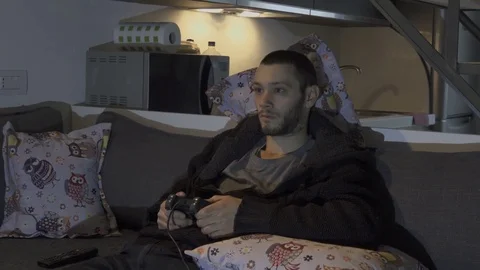 Bored Man play with Videogames Stock Footage 72238664