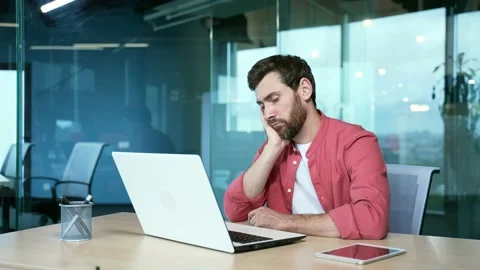 Bored men in the office Sleeping sleepy yawning boredom at workplace indoors.  Stock Footage 234143983