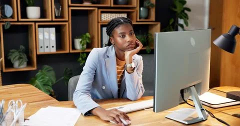 Bored, reading and computer with business black woman for research, tired a.. Stock Photos