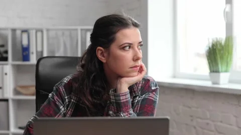 Bored sad Caucasian worker tired unmotivated and disinterested in dull work with Stock Footage 166364327