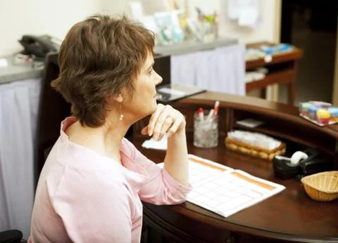 Bored Store Clerk Foto stock