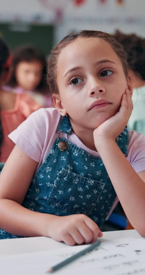 Bored student, thinking and child in classroom for education, problem solving or Stock Footage 307997396