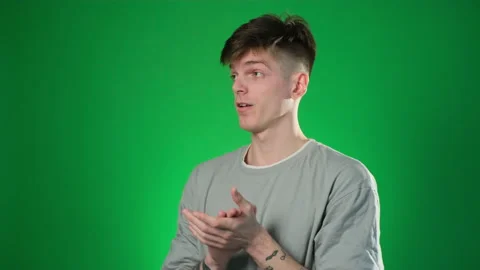 Bored tattooed man clapping hands Stock Footage 209133094