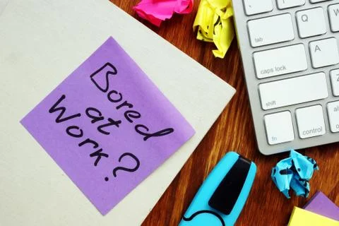 Bored at work Question about procrastination. Stock Photos