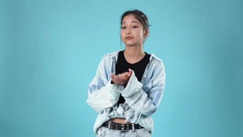 Bored Young Woman Clapping Sarcastically Against Blue Background Vidéo 346229664