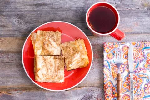 Borek served with a cup of tea Foto stock