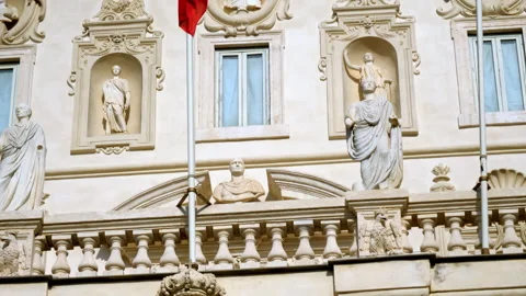 Borghese Gallery building adorned with statues a flag flying in front Stock Footage 267895330