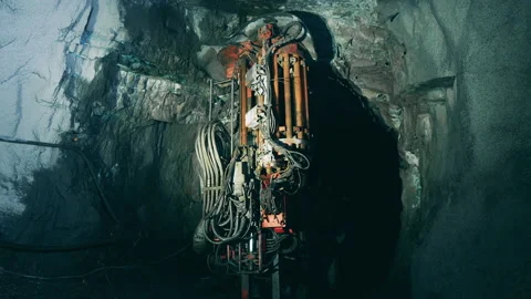 Boring machine is irrigating walls of an underground mine Stock Footage 158355617