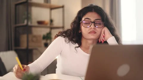 Boring tired young student freelancer with glasses can not study or work Stock Footage 251732399