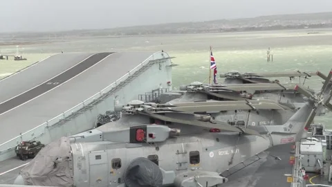 Boris Johnson takes a closer look at HMS Queen Elizabeth Stock Footage 154459813