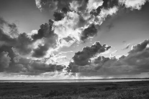 Borkum Germany Dramatic sunset over the mudflats of the Wadden Sea (Waddenzee Stock Photos