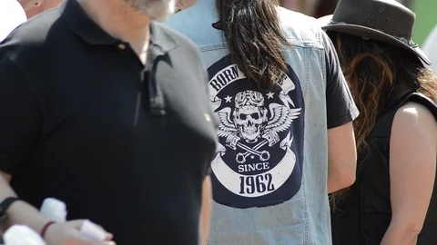 Born to Ride since 1962 in a patch or coat of a biker's cowboy vest Vídeos de archivo 89985255