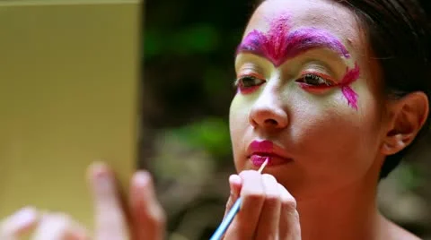 Borneo Rainforest Tribal Culture: Face Painting Stock Footage