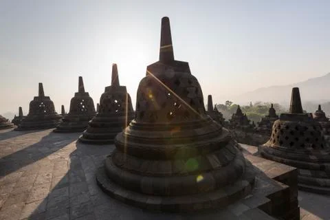 Borobudur temple complex on the island of Java in Indonesia in the morning at Fotos Stock