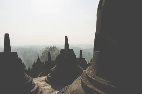 Borobudur temple complex on the island of Java in Indonesia in the morning at Fotos de archivo