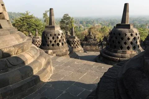Borobudur temple complex on the island of Java in Indonesia in the morning at Fotos de archivo