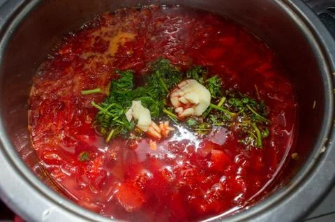 Borsch. Beetroot soup is cooked in a pot. Stock Photos