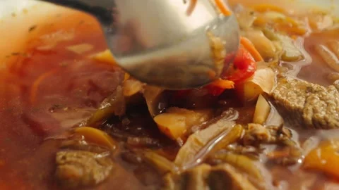 Borscht soup close up. Soup with meat, beets, cabbage, and potatoes, carrot Stock Footage 321456086
