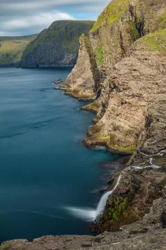 Bosdalafossur waterfall vertical composition long exposure, Faroe Islands Stock Photos
