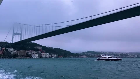 Bosophorus bridge in dramatic weather. Bosphorus bridge rainy weather Stock Footage 203970742