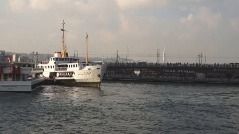 Bosphorus and Eminonu district with the mosques in the background in  Istanbul Stock Footage 116811657