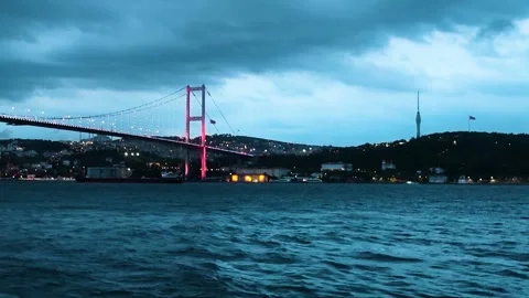 Bosphorus Bridge with Red Lights at Twilight and Camlica Tower, Istanbul Stock Footage 328257241