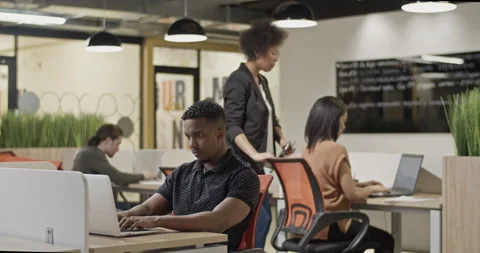 Boss checking employees in office Stock Footage 195217764